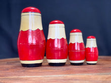 Load image into Gallery viewer, Vintage Christmas. 4 piece Nesting wooden Santa dolls.
