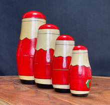 Load image into Gallery viewer, Vintage Christmas. 4 piece Nesting wooden Santa dolls.
