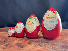 Load image into Gallery viewer, Vintage Christmas. Egg Shaped Nesting Santa’s
